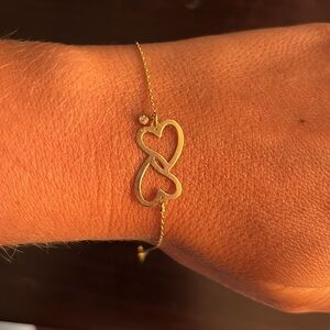Gold hearts bracelet with diamond